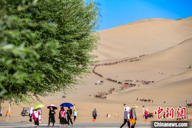 敦煌旅游升溫“不打折扣”:文旅演藝插“科技翅膀”升級引客